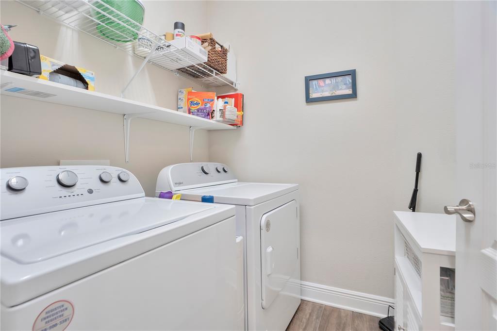 13541 Circa Crossing Drive Lithia, FL 33547 - Photo 10 of 52 a utility room with dryer and washer