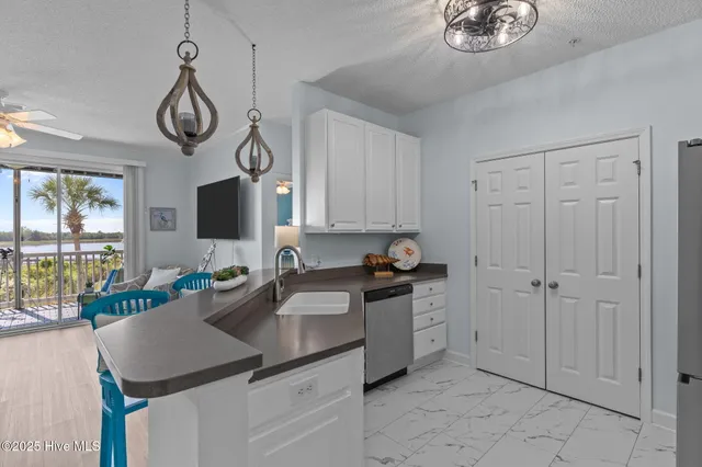 $425,900 | 1135 Park Road Southwest, Unit 4103, Sunset Beach, NC 28468