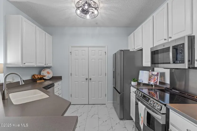 $425,900 | 1135 Park Road Southwest, Unit 4103, Sunset Beach, NC 28468