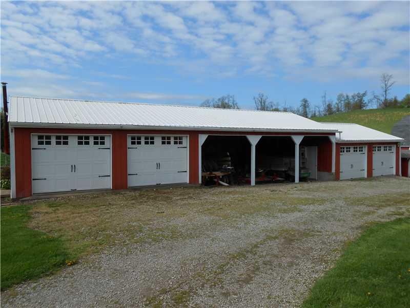 110 McGirts Road Daisytown, PA 15427 - Photo 8 of 25 Parking Lot/Garage. 24x78 building with 4 garages, concret and electric. 3 open parking stalls