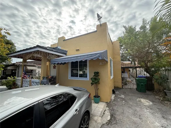 a view of house with outdoor space