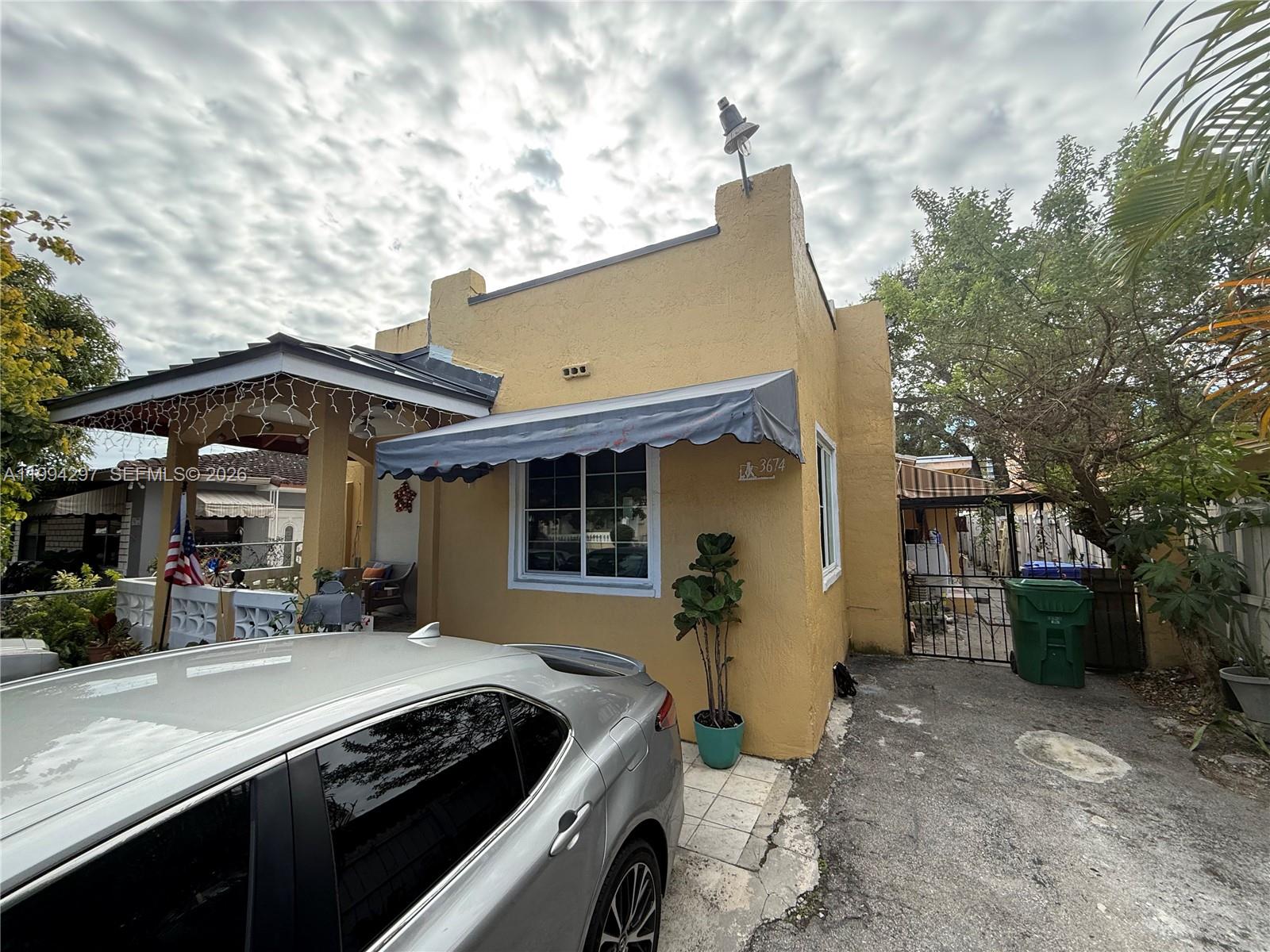3674 Southwest 25th Street Miami, FL 33133 - Photo 2 of 15 a view of house with outdoor space