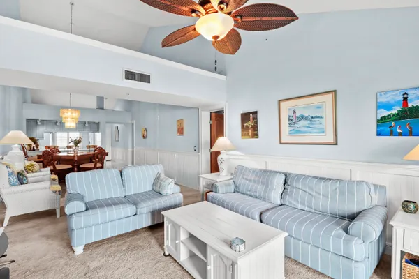 a living room with furniture and a couch