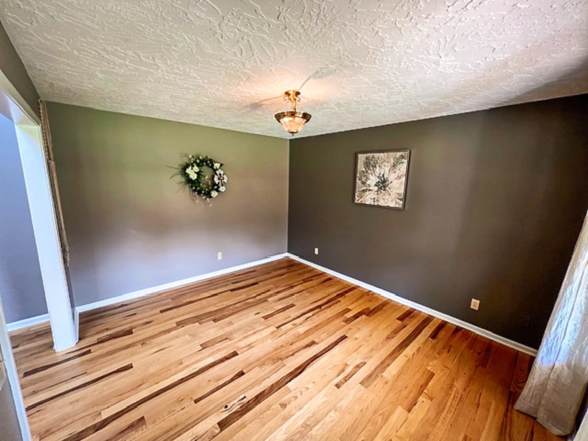 5030 Rogers Marshall Road Union City, TN 38261 - Photo 16 of 40 a view of a room with a ceiling fan