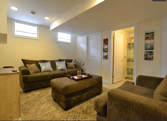 a living room with furniture and a couch