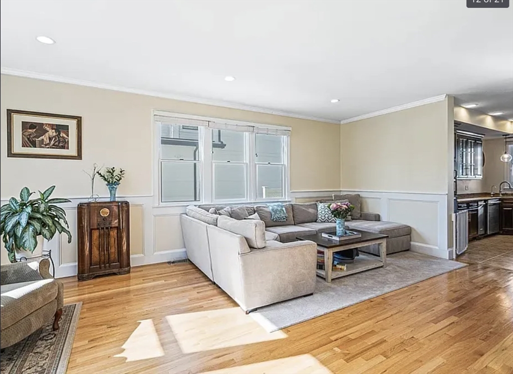 58 Spiers Road Newton, MA 02459 - Photo 3 of 19 a living room with furniture and a rug