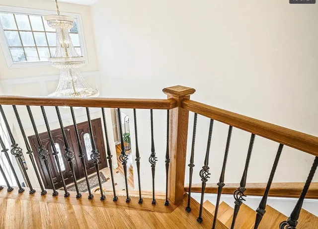 a view of entryway with wooden floor