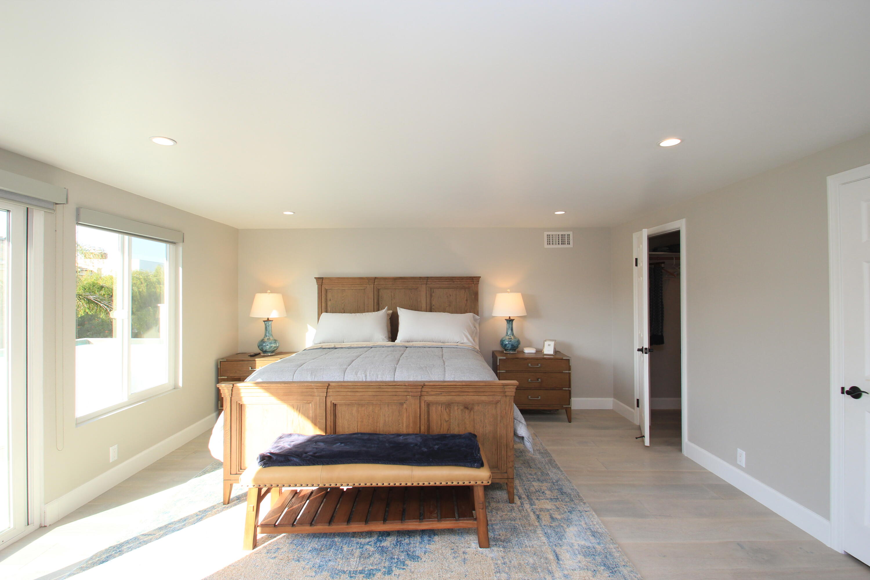 5235 Sealane Way Oxnard, CA 93035 - Photo 21 of 57 a bedroom with a bed and large window