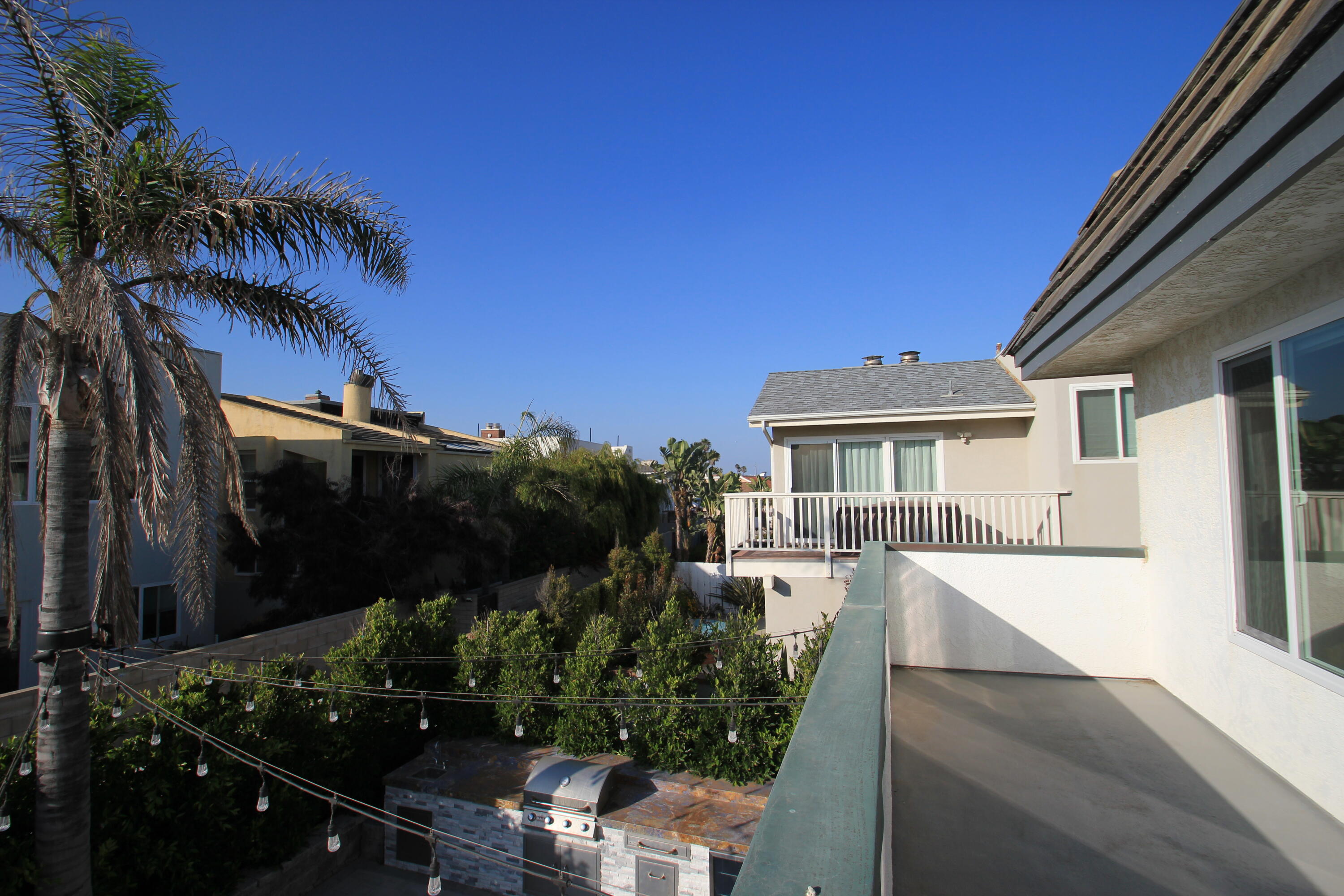 5235 Sealane Way Oxnard, CA 93035 - Photo 24 of 57 a front view of a house with a yard