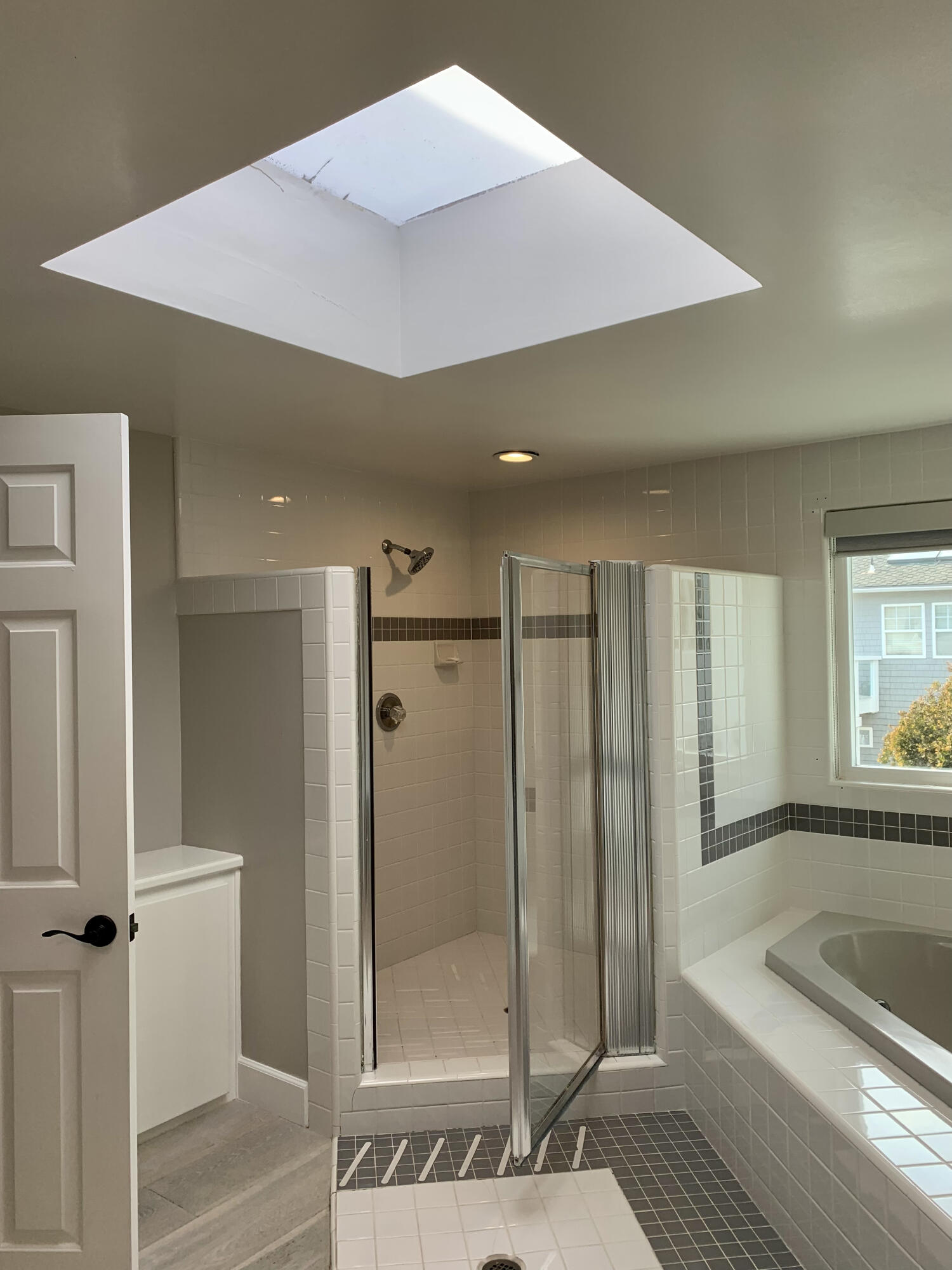 5235 Sealane Way Oxnard, CA 93035 - Photo 28 of 57 a bathroom with a granite countertop sink a toilet and shower