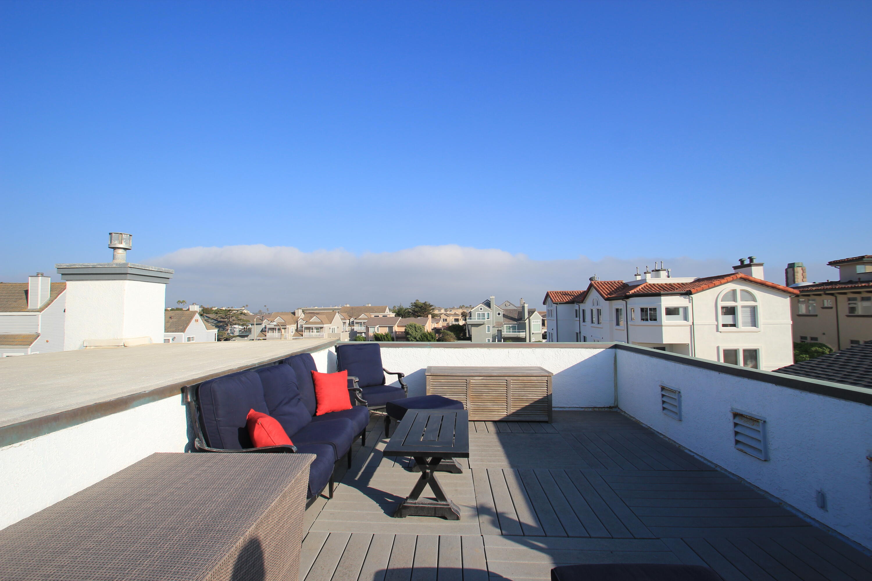 5235 Sealane Way Oxnard, CA 93035 - Photo 35 of 57 a view of a balcony with chair and wooden floor