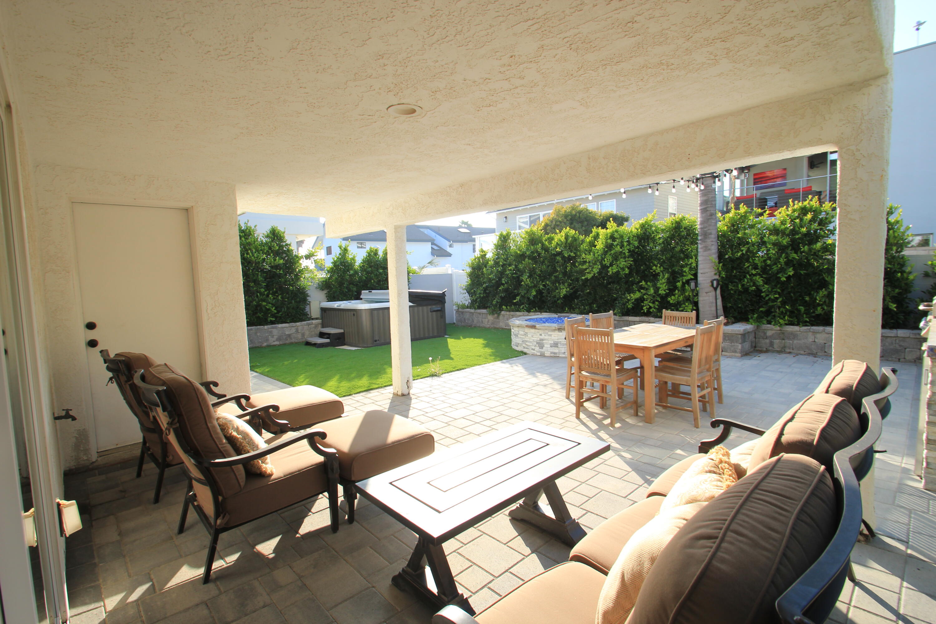 5235 Sealane Way Oxnard, CA 93035 - Photo 40 of 57 a view of a patio with a dining table and chairs