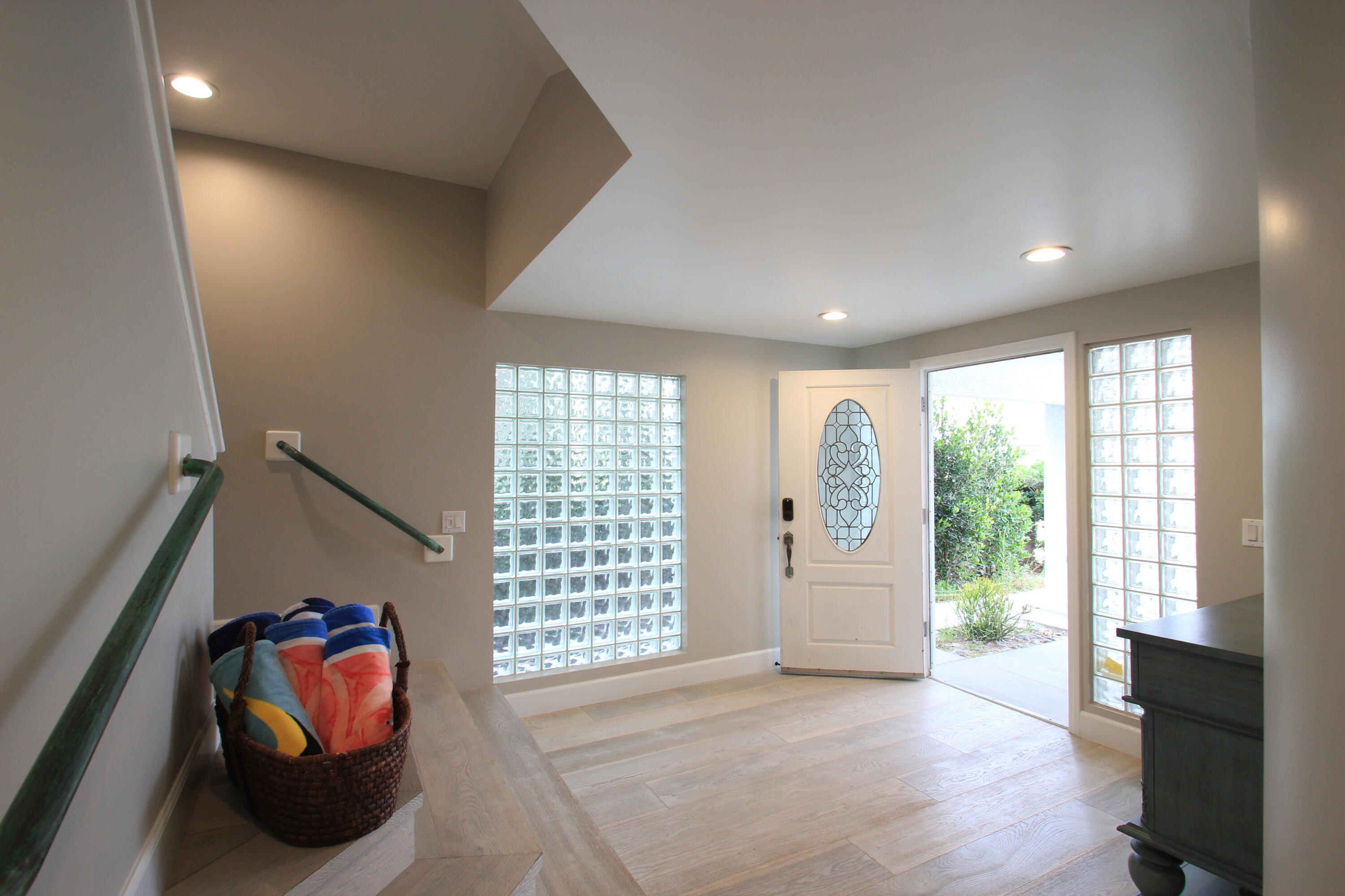 5235 Sealane Way Oxnard, CA 93035 - Photo 6 of 57 an empty room with windows and wooden floor
