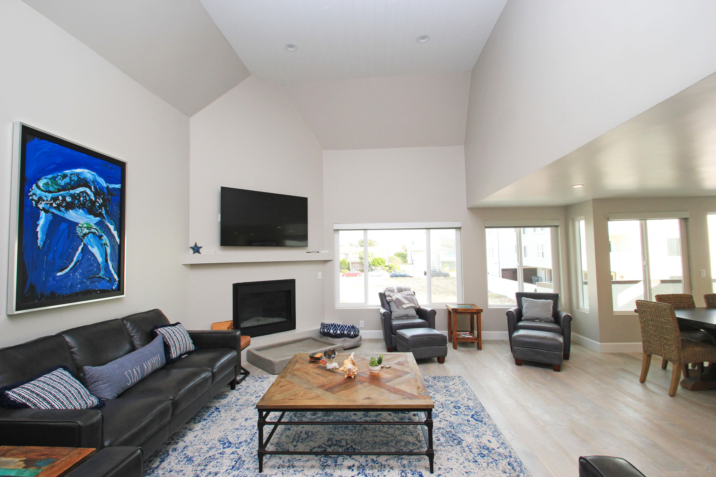 5235 Sealane Way Oxnard, CA 93035 - Photo 8 of 57 a living room with furniture a flat screen tv and a fireplace