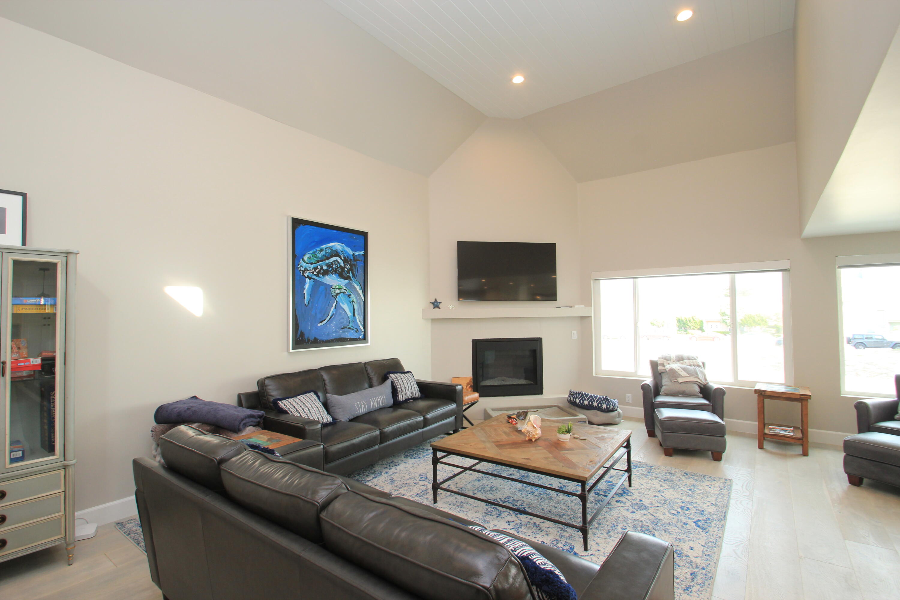 5235 Sealane Way Oxnard, CA 93035 - Photo 9 of 57 a living room with furniture or couch and a fireplace