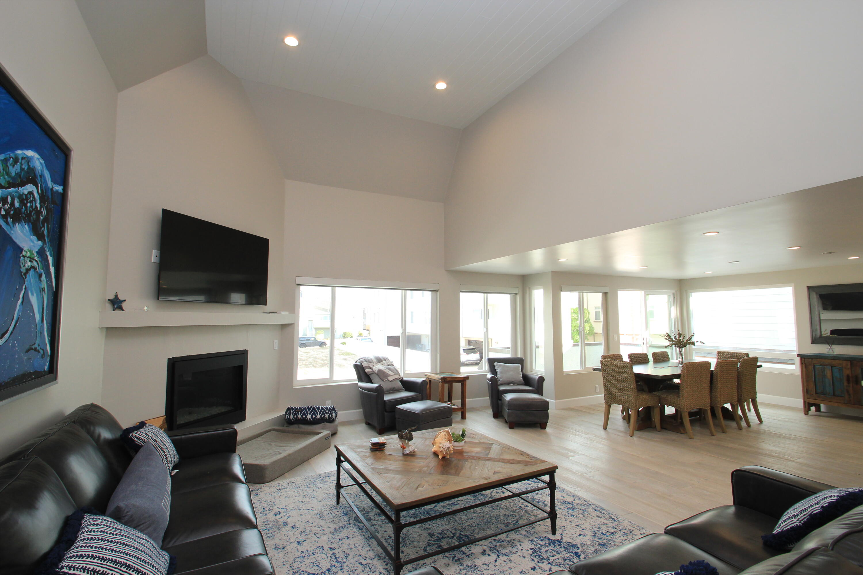 5235 Sealane Way Oxnard, CA 93035 - Photo 10 of 57 a living room with furniture flat screen tv a rug and a fireplace