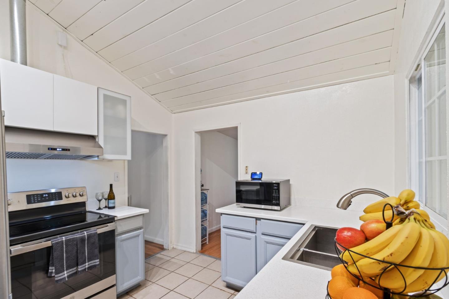 320 Fireside Road Boulder Creek, CA 95006 - Photo 11 of 36 a kitchen with stainless steel appliances kitchen island granite countertop a stove and a sink