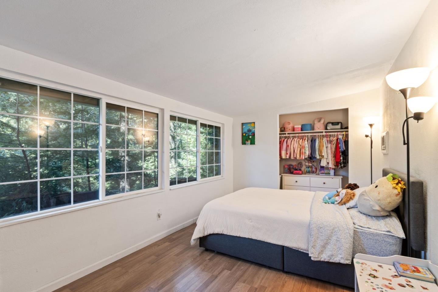 320 Fireside Road Boulder Creek, CA 95006 - Photo 18 of 36 a bedroom with a large bed and a large window