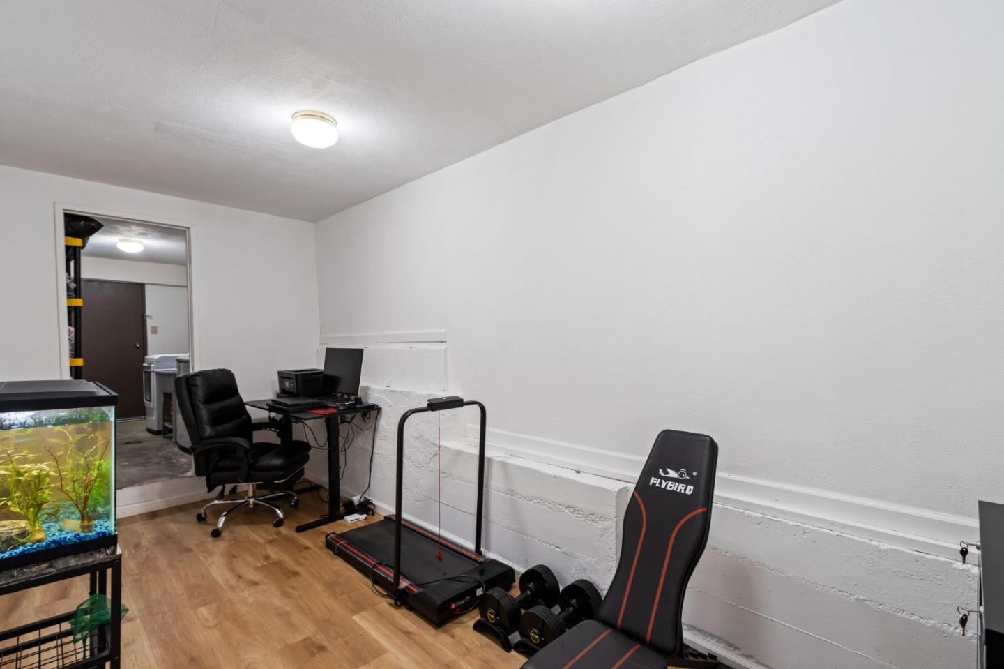 320 Fireside Road Boulder Creek, CA 95006 - Photo 29 of 36 a view of a workspace with furniture and a window