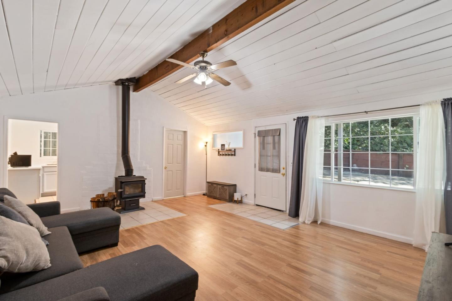 320 Fireside Road Boulder Creek, CA 95006 - Photo 8 of 36 a living room with furniture and a window