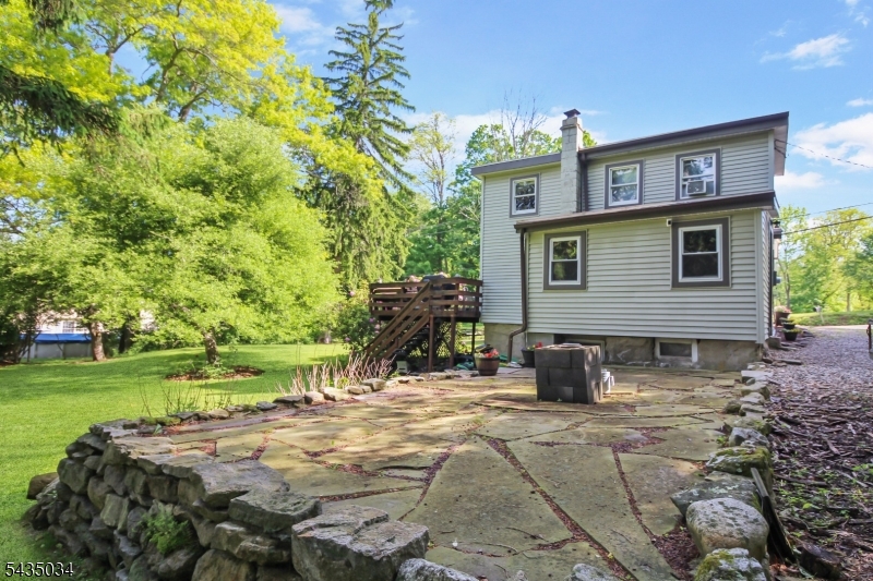 103 Petersburg Road Hackettstown, NJ 07840 - Photo 15 of 18 a view of a house with backyard and sitting area