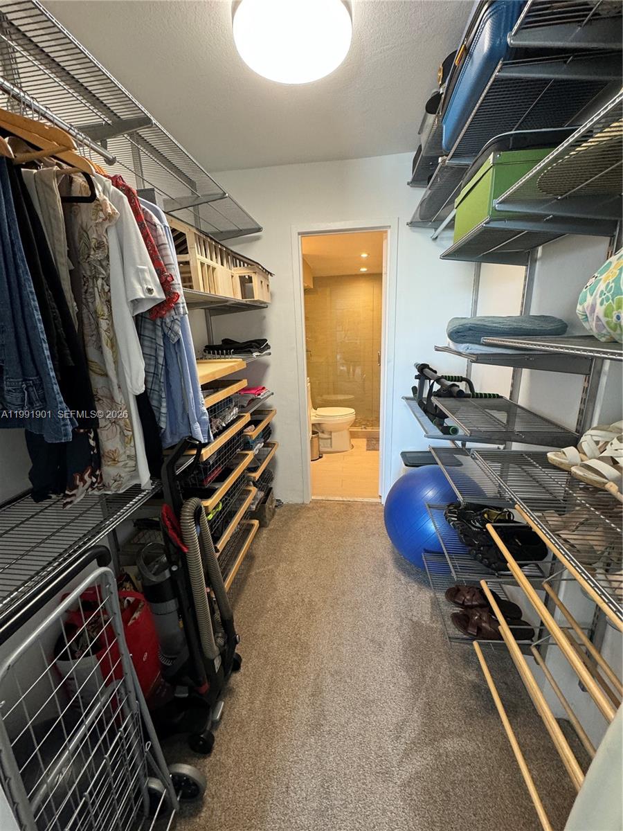 150 Southeast 25th Road, Unit 11L Miami, FL 33129 - Photo 7 of 11 a storage and utility room with furniture