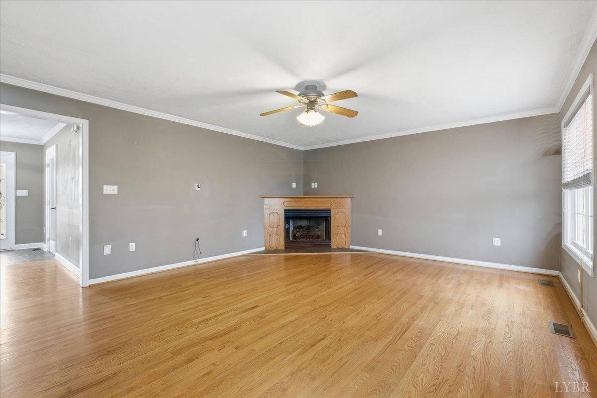 1329 Jeb Stuart Place Forest, VA 24551 - Photo 15 of 60 wooden floor in an empty room with a window