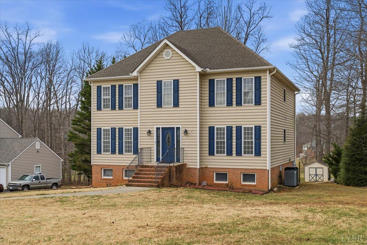 1329 Jeb Stuart Place Forest, VA 24551 - Photo 2 of 60 a front view of a house with a yard