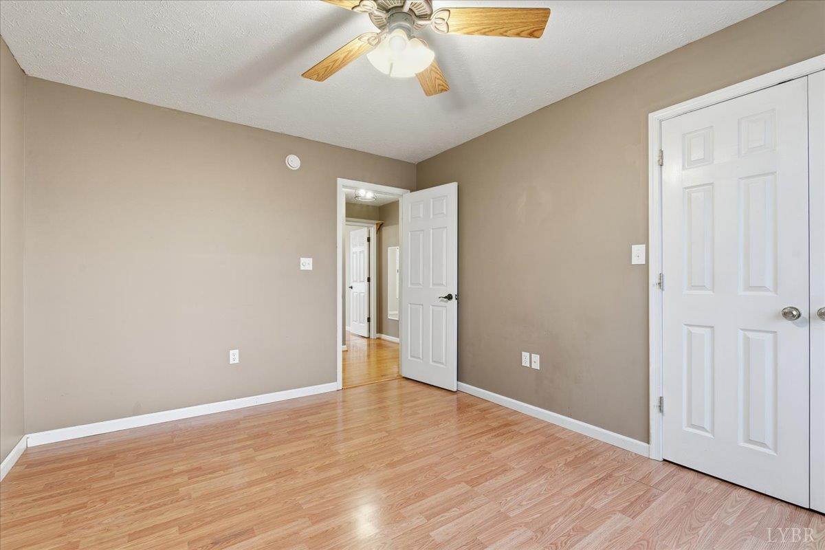 1329 Jeb Stuart Place Forest, VA 24551 - Photo 36 of 60 a view of an empty room with wooden floor