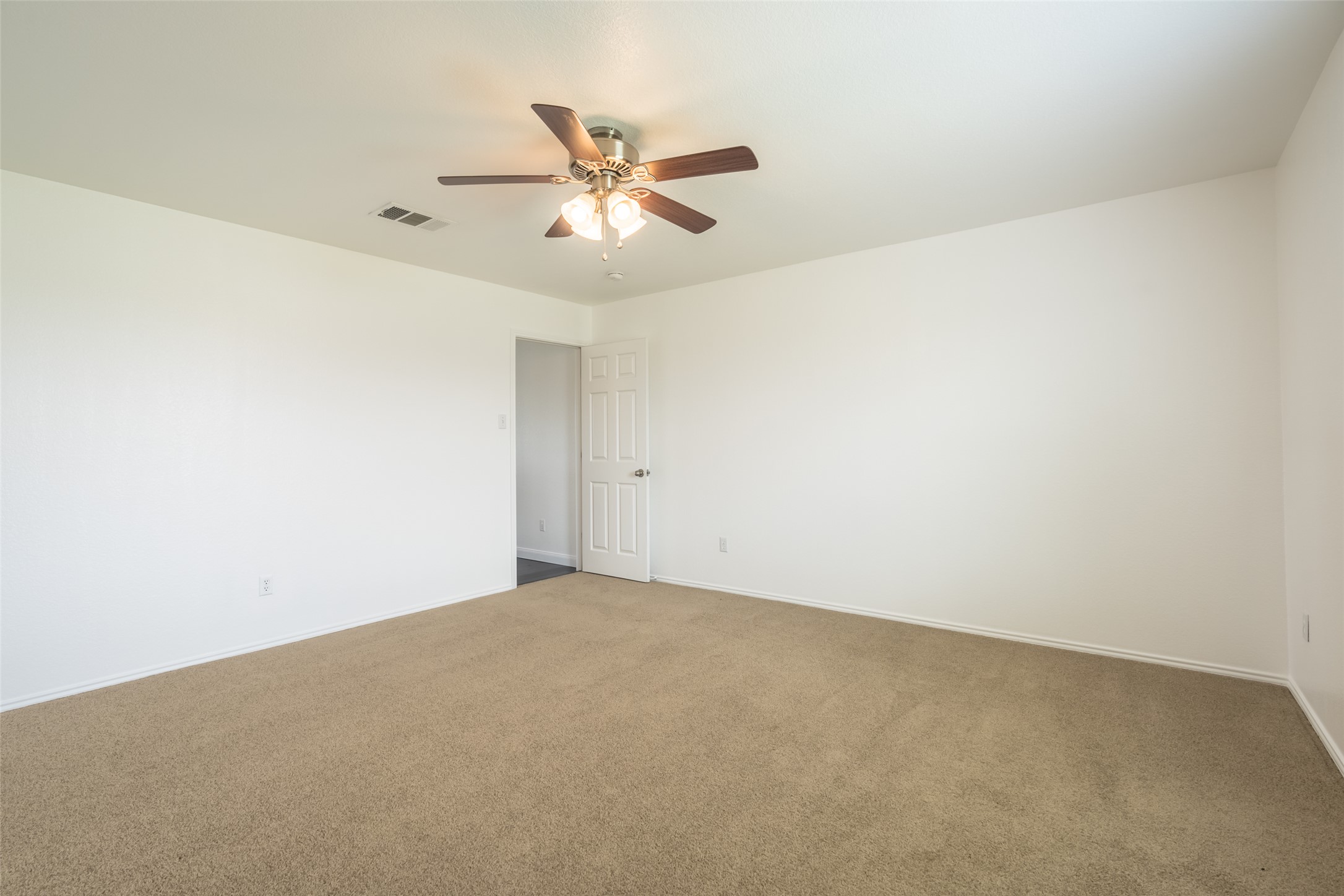 1013 Ranchero Road Leander, TX 78641 - Photo 14 of 30 Soft carpeting underfoot provides a comfortable foundation for this versatile room.
