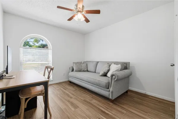 a living room with a couch and a table