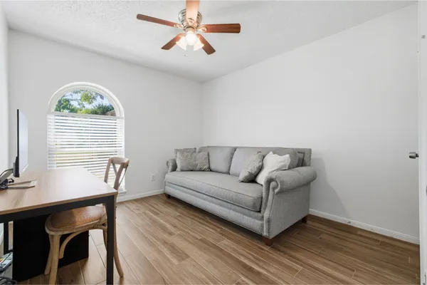 a living room with a couch and a table