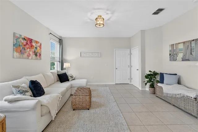 a kitchen with kitchen island granite countertop a sink stainless steel appliances and cabinets