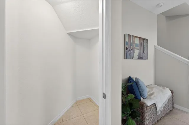 a bathroom with a sink vanity mirror and toilet