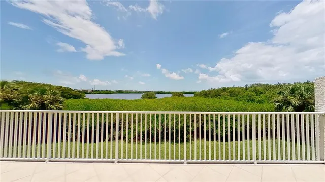 a view of a city street from a balcony
