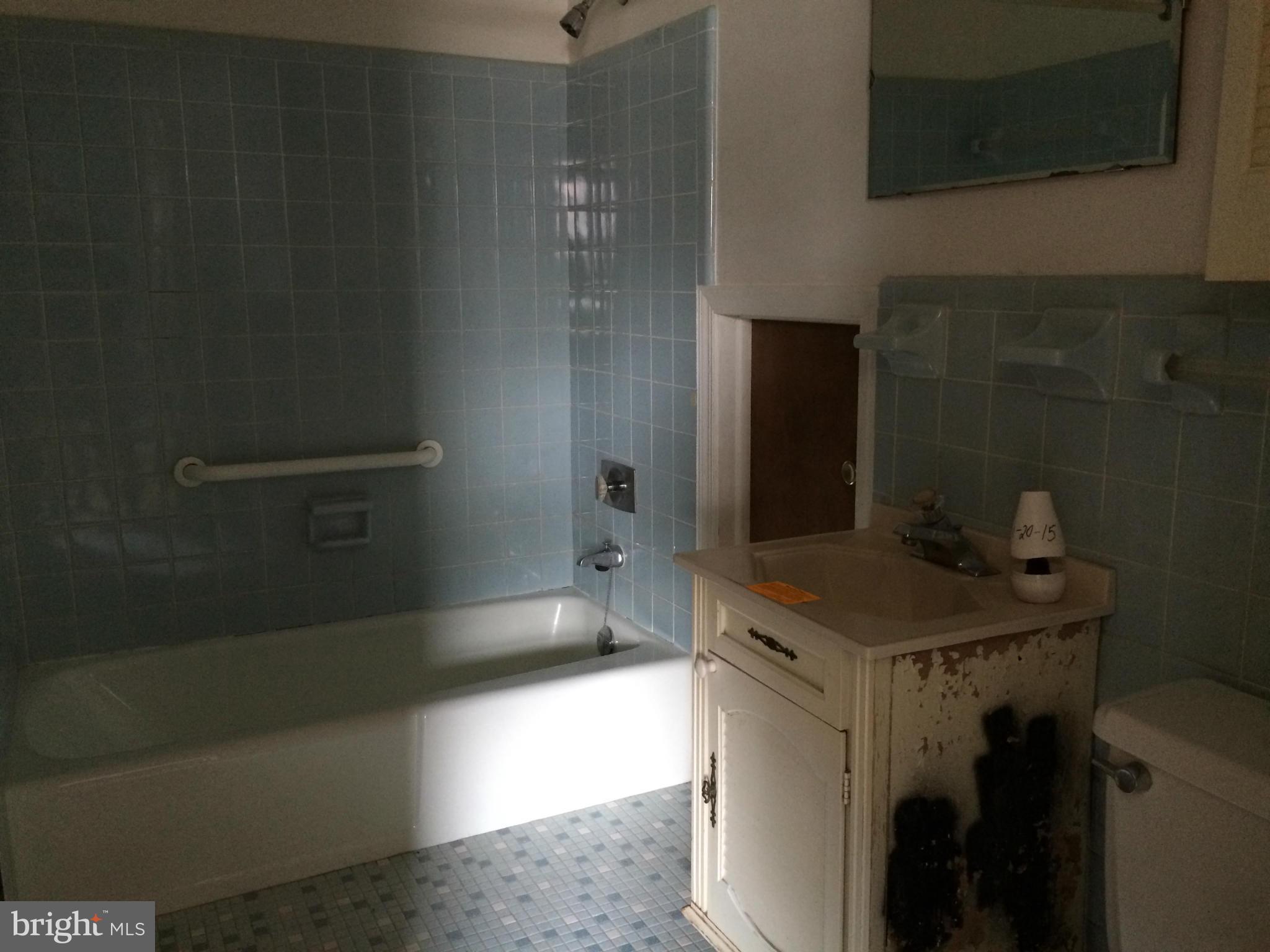 3704 Fairly Street Silver Spring, MD 20906 - Photo 12 of 24 a bathroom with a sink a toilet and bathtub