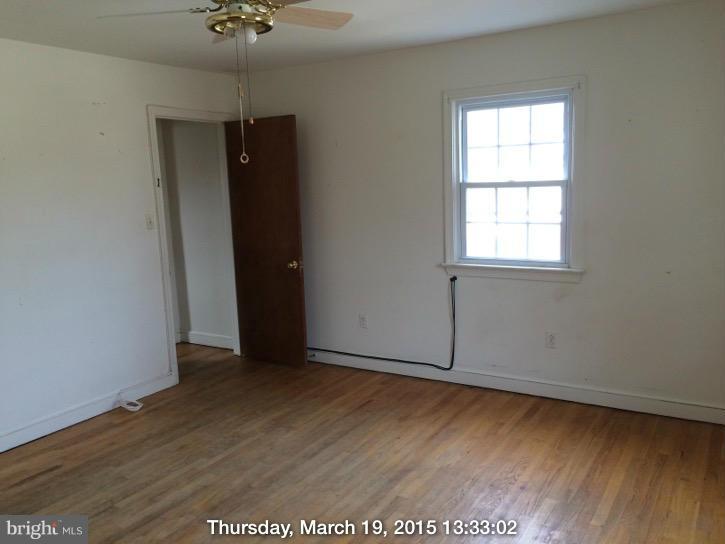 3704 Fairly Street Silver Spring, MD 20906 - Photo 15 of 24 an empty room with wooden floor and windows