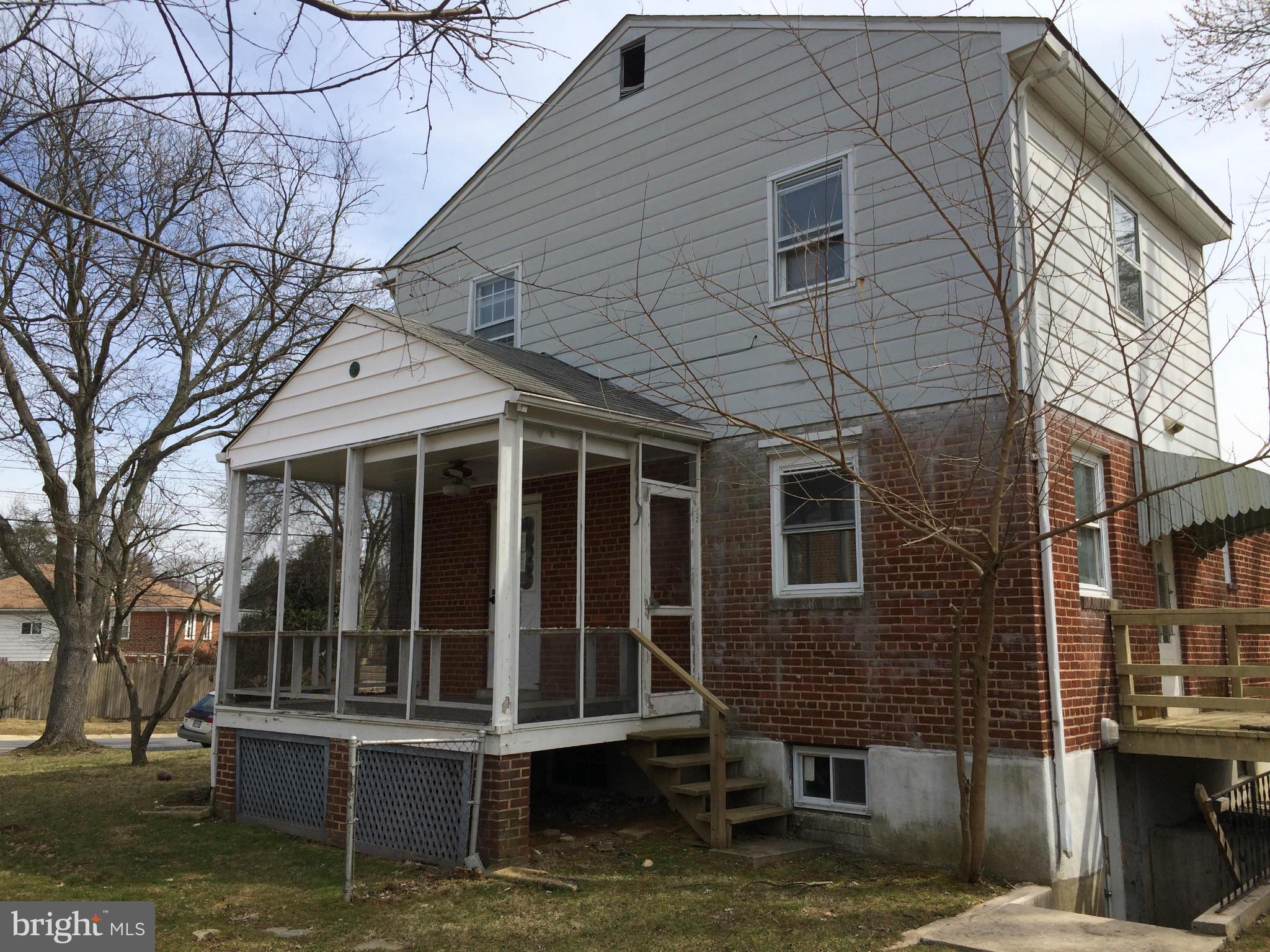 3704 Fairly Street Silver Spring, MD 20906 - Photo 19 of 24 a view of house with large windows and a table