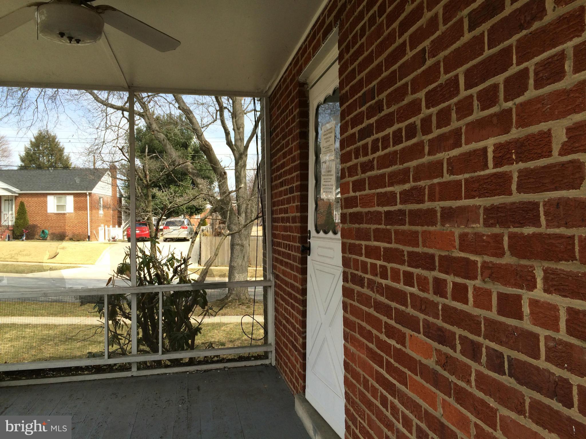 3704 Fairly Street Silver Spring, MD 20906 - Photo 20 of 24 a room with water heater and a floor to ceiling window