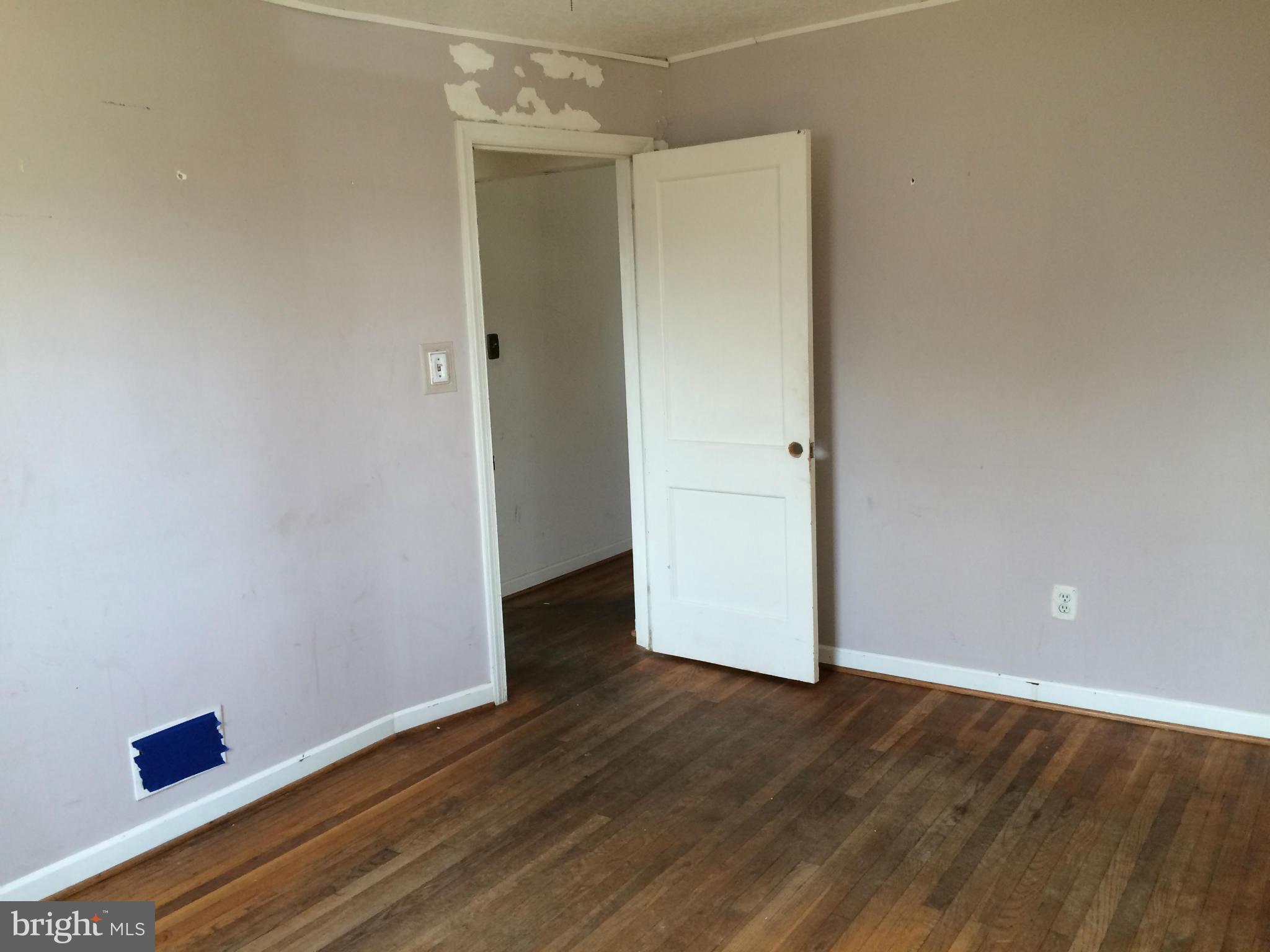 3704 Fairly Street Silver Spring, MD 20906 - Photo 5 of 24 a view of an empty room with wooden floor