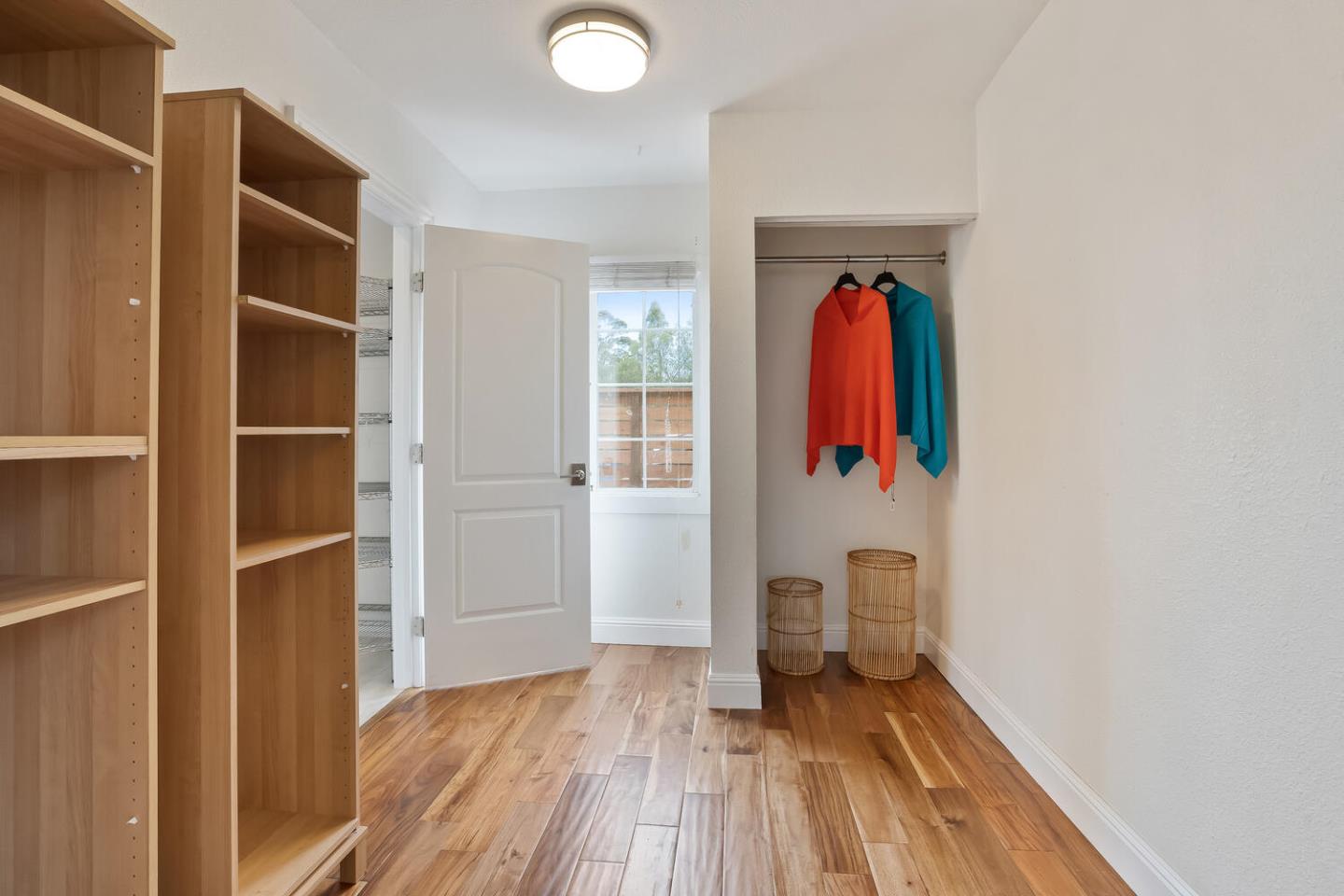 1100 Humboldt Road Brisbane, CA 94005 - Photo 20 of 37 a view of a room with wooden floor and entryway