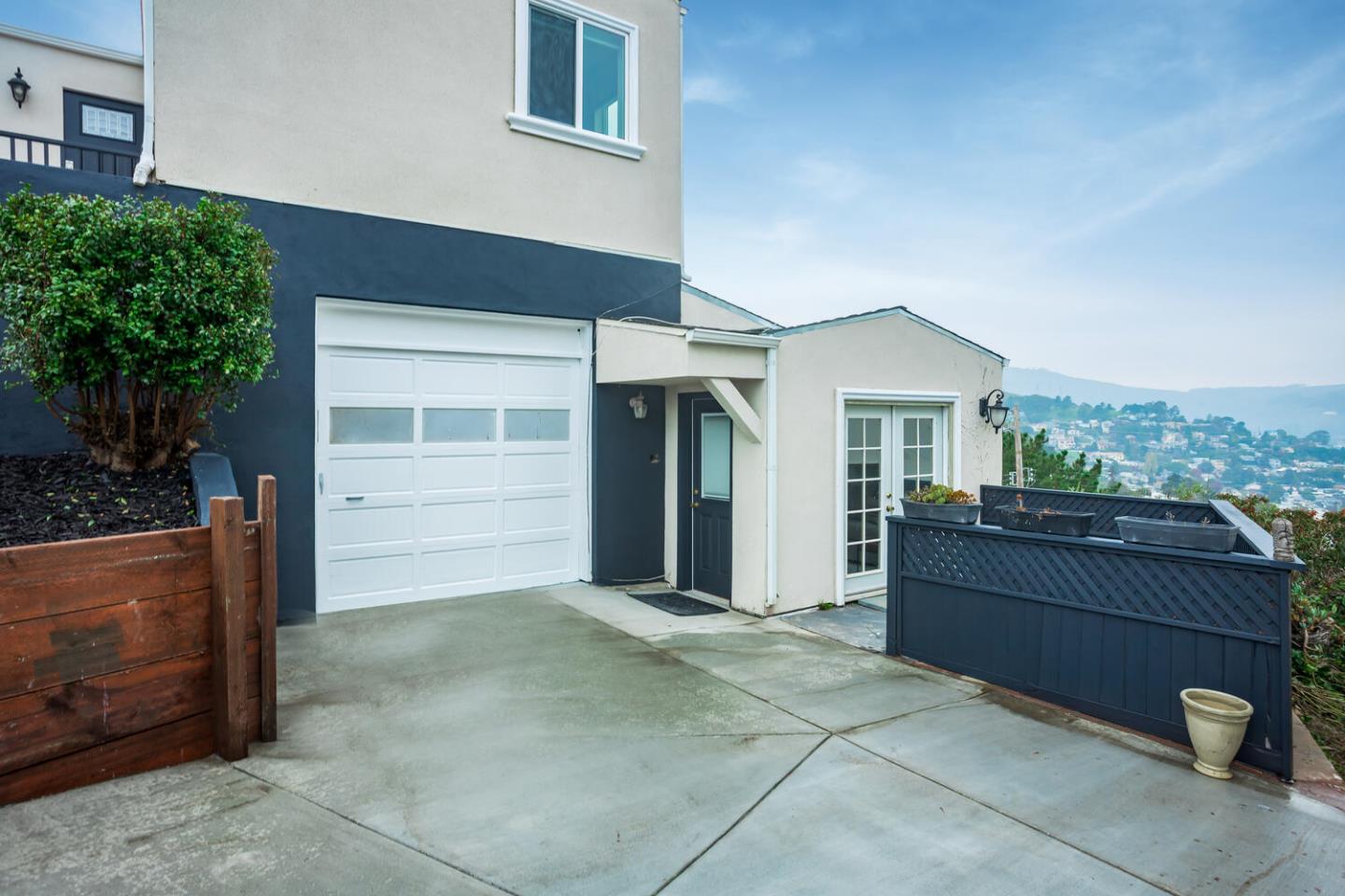 1100 Humboldt Road Brisbane, CA 94005 - Photo 26 of 37 a view of house with backyard
