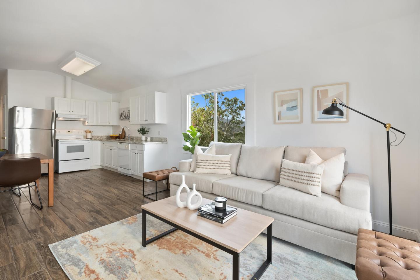 1100 Humboldt Road Brisbane, CA 94005 - Photo 27 of 37 a living room with furniture and a wooden floor