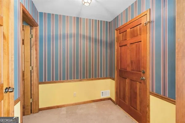 a bathroom with a tub and shower