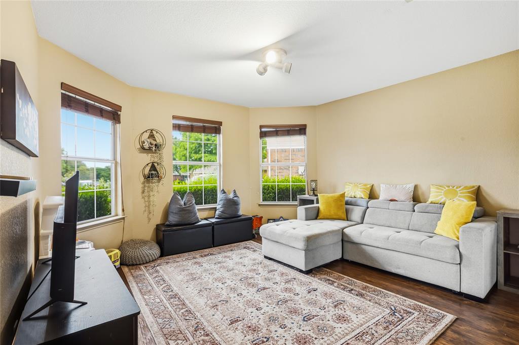 2701 Rudder Lane McKinney, TX 75071 - Photo 12 of 21 Spacious bedroom at front of home with great natural light