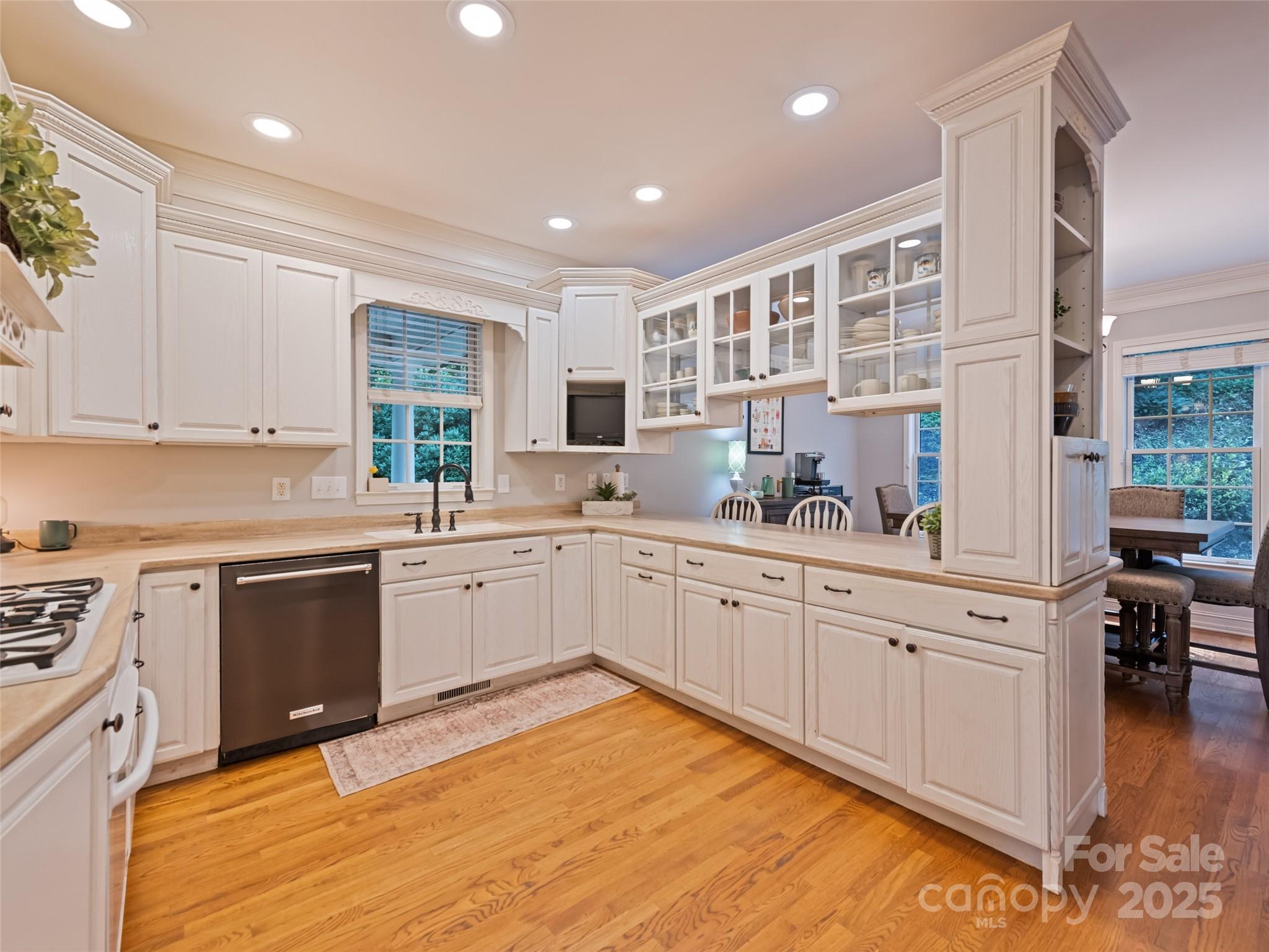 40 Panda Trail Waynesville, NC 28785 - Photo 21 of 47 a kitchen with a sink window and cabinets