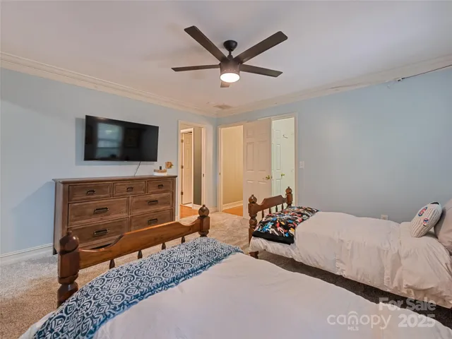 a bedroom with a bed and furniture