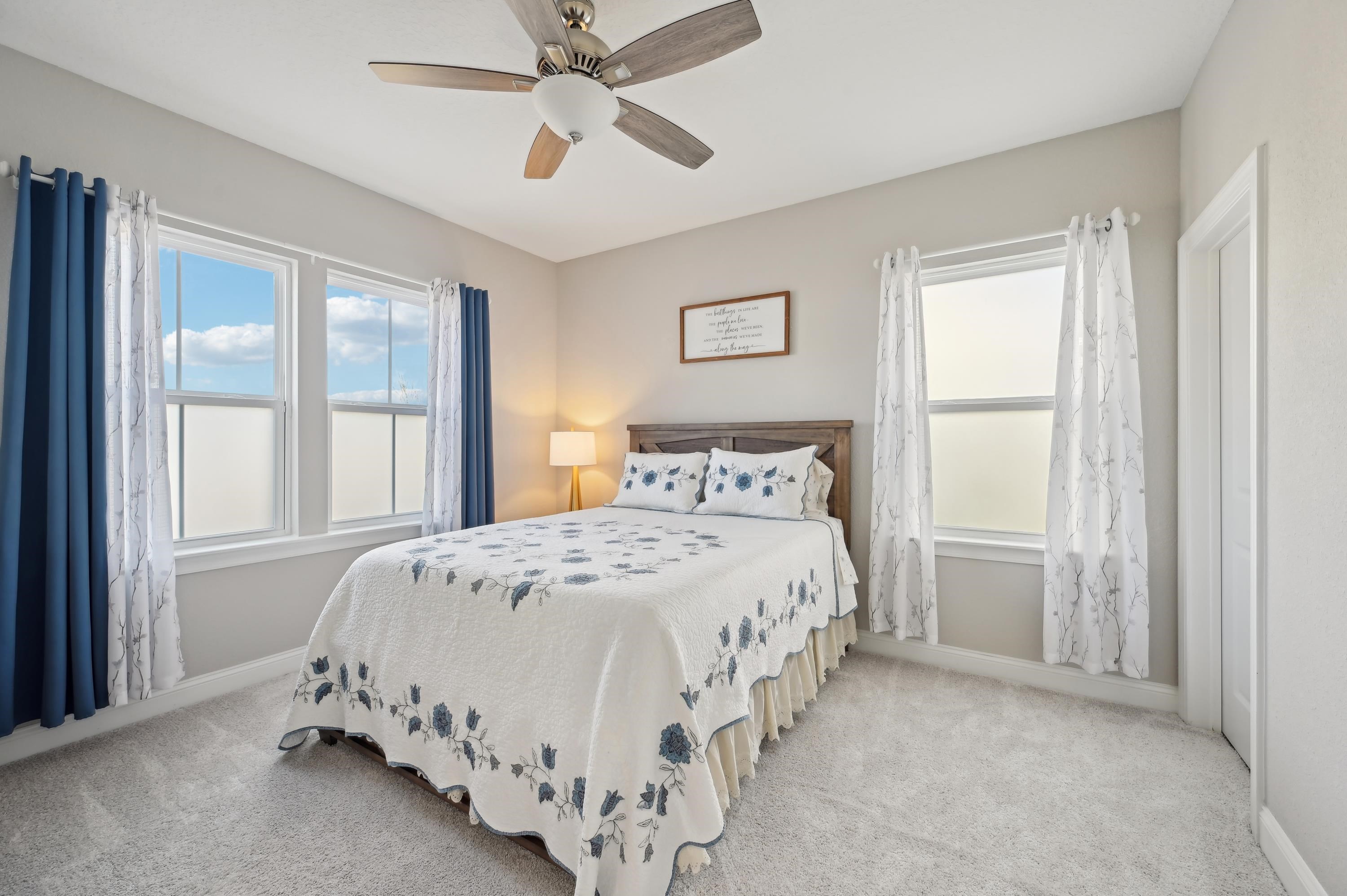 57 Sunset Ridge Court St. Johns, FL 32259 - Photo 21 of 79 Bedroom with carpet floors, a ceiling fan, and multiple windows