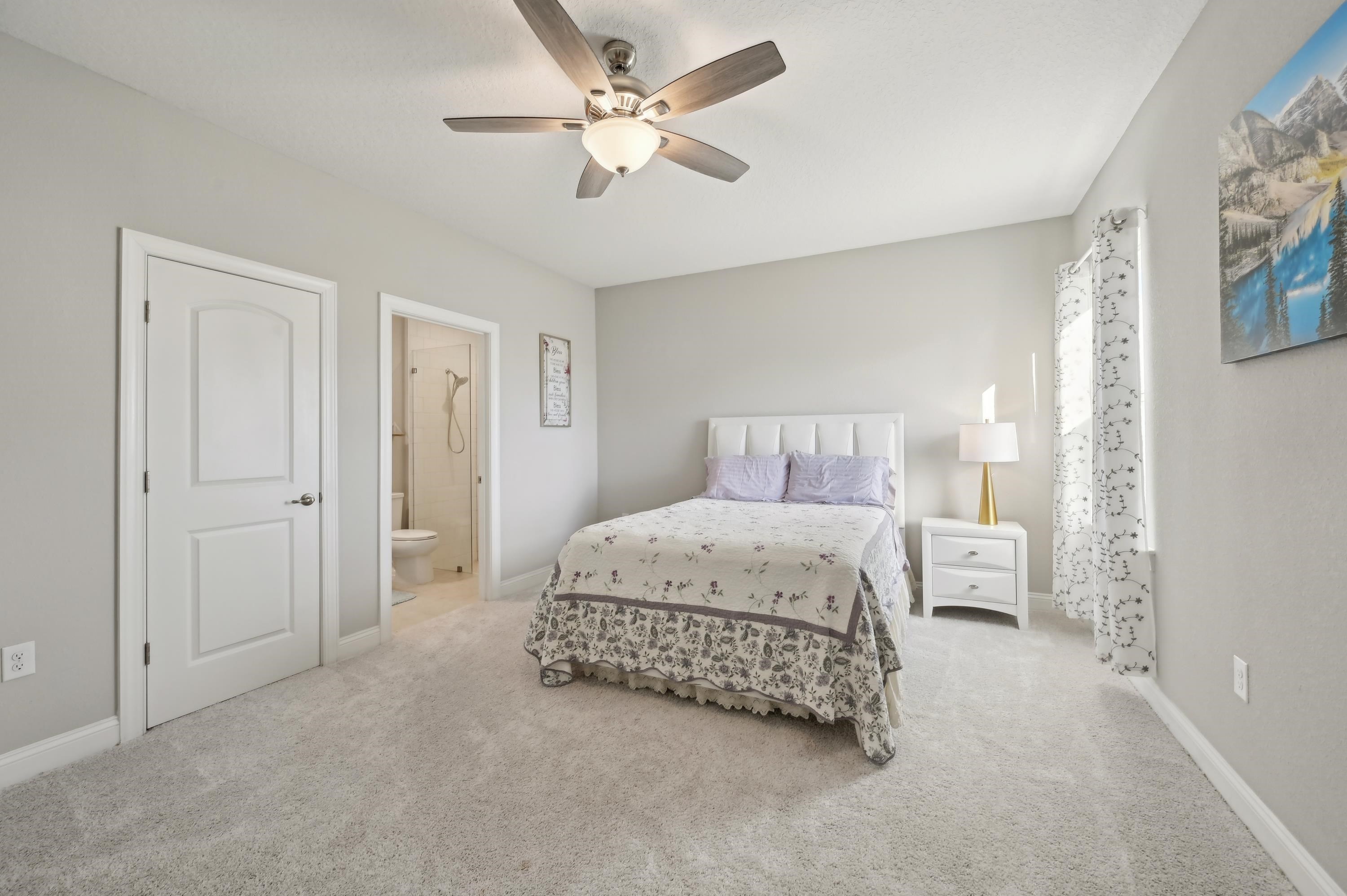 57 Sunset Ridge Court St. Johns, FL 32259 - Photo 24 of 79 a bedroom with a bed and a ceiling fan