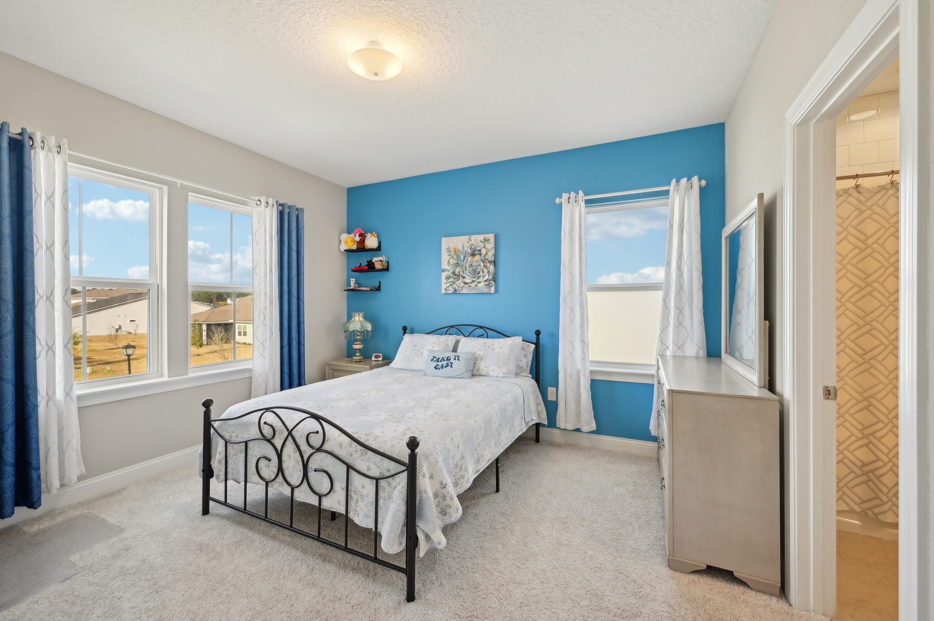 57 Sunset Ridge Court St. Johns, FL 32259 - Photo 39 of 79 Bedroom featuring light carpet and a textured ceiling